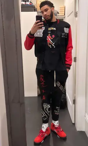 Jayson Tatum wearing All Things Haram pants