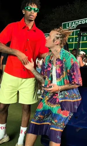 21 Savage wearing Bottega Veneta shirt