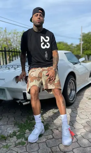 Nicky Jam wearing Nike sock