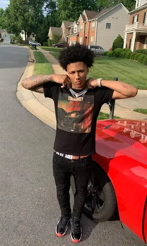 Mikey wearing Never Broke Again t-shirt