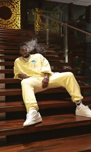 Diddy wearing Palm Angels pants