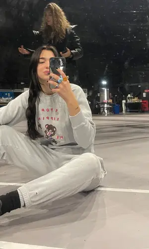 Dua Lipa wearing Puma sneakers