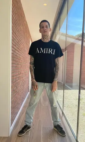 Kizaru’s Outfit in Amiri T-Shirt, Jordan Sneakers & Travis Scott Merch (2021)