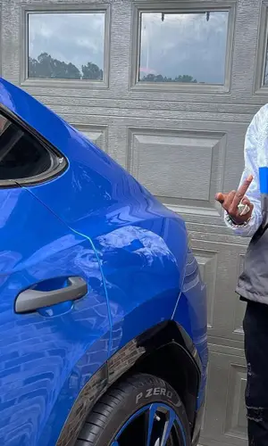 Young Dolph wearing New Era cap