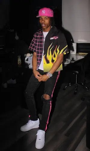 Lil Baby wearing Prada shirt