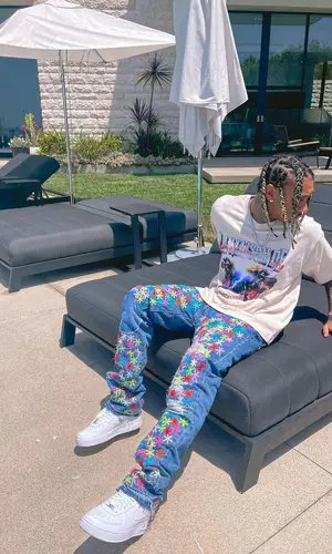 Tyga wearing Pale jeans