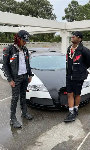 Lil Gnar wearing Alpinestars jacket