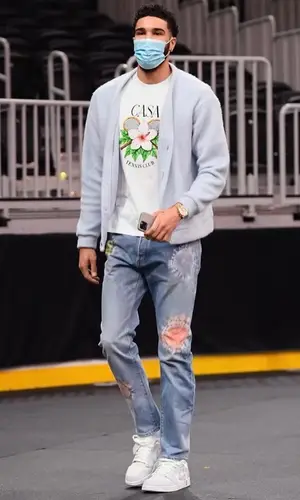Jayson Tatum wearing John Elliott jeans