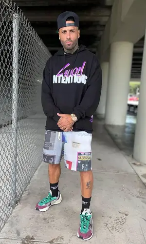 Nicky Jam wearing Vlone hoody