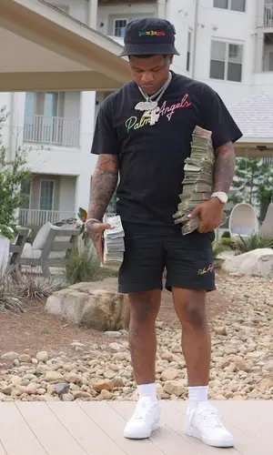 Rylo Rodriguez wearing Palm Angels shorts