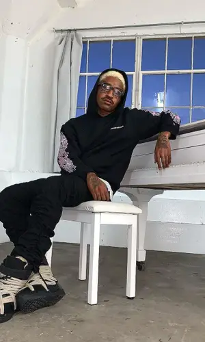 Lil Tracy’s Outfit in Matty Boy Hoodie, Moncler Boots & Chrome Hearts Eyewear (2021)