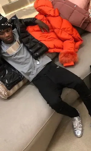 Quando Rondo wearing Moncler jacket