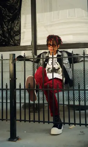 Iann Dior wearing Comme Des Garcons pants