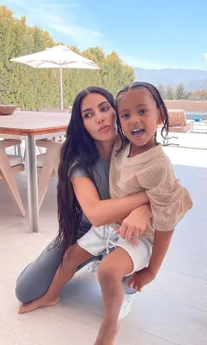Kim Kardashian wearing Vans sneakers