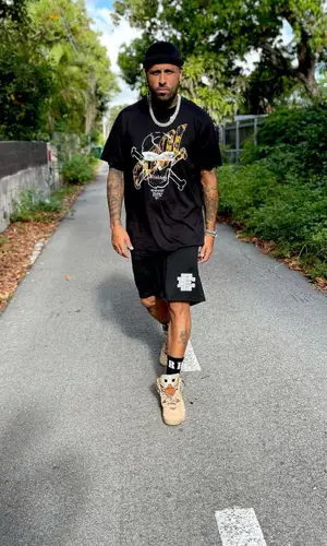 Nicky Jam wearing Rhude sock