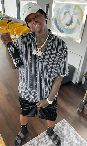 Moneybagg Yo wearing Balenciaga sandal
