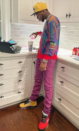 Key Glock wearing Louis Vuitton sweatshirt