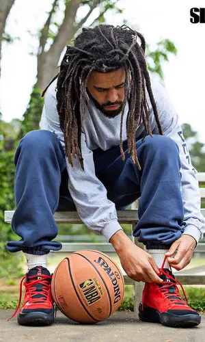 J. Cole wearing Gallery Dept. sweatshirt