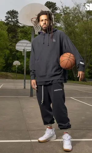 J. Cole wearing Hounds pants