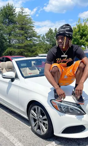 Unghetto Mathieu wearing Jordan sneakers