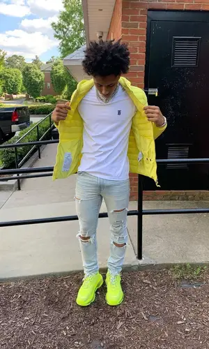 Mikey wearing Stone Island jacket