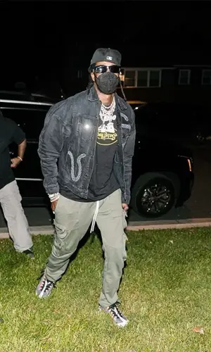 2 Chainz wearing Louis Vuitton bag
