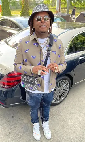 Gunna wearing Dior bag