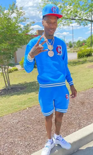 Rubberband OG wearing Benjii & Co sweatshirt