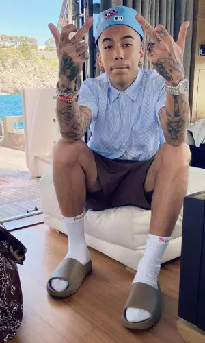 Sfera Ebbasta wearing Polo Ralph Lauren swimwear