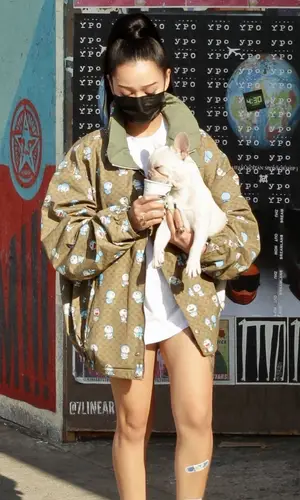 Bella Poarch wearing Prada boots