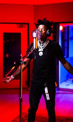 Yungeen Ace wearing Givenchy t-shirt