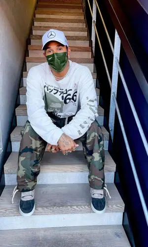 Lewis Hamilton wearing Mercedes Benz cap