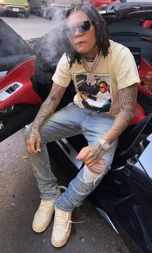 Young M.A wearing Louis Vuitton eyewear