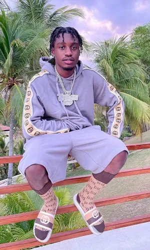 Lil Tjay wearing Gucci sock
