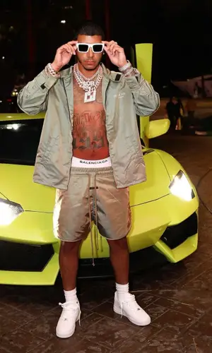 CJ wearing Fear of God jacket