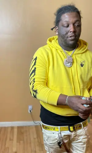 Rio Da Yung Og wearing Off-White belt