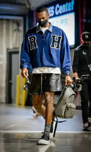 Rajon Rondo wearing Rhude shirt
