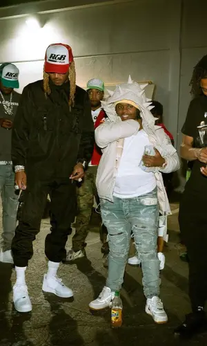 Future wearing Prada shirt