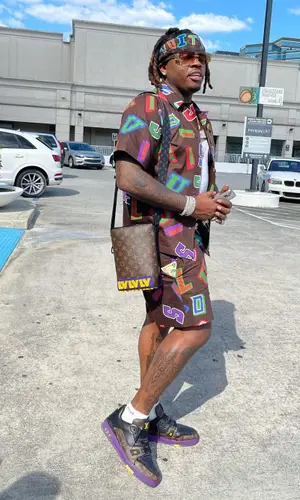 Gunna wearing Louis Vuitton bag