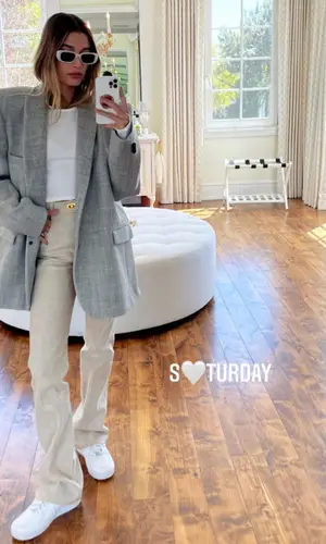 Hailey Bieber wearing Bottega Veneta jeans