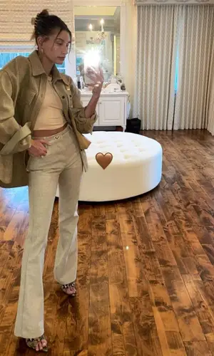 Hailey Bieber wearing Bottega Veneta jeans