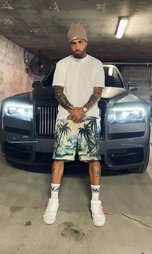 Nicky Jam wearing Kith hat