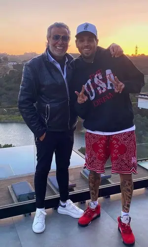 Chris Brown wearing Rhude hoody