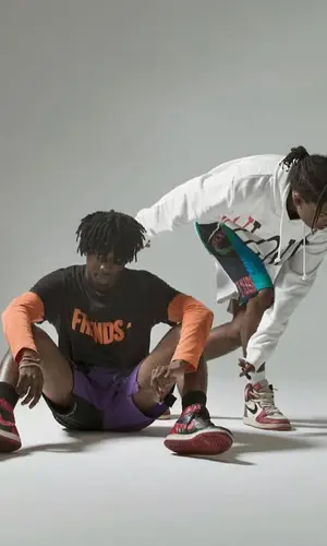 ASAP Rocky wearing Vlone shorts