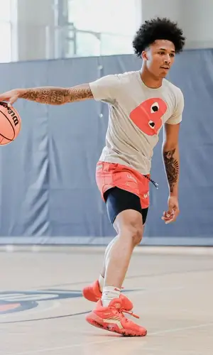 Mikey wearing Nike sock