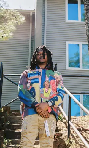 Young Nudy wearing Gucci belt