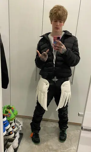 SODA LUV’s Outfit in Prada Jacket, Amiri T-Shirt & Vivienne Westwood Belt (2021)