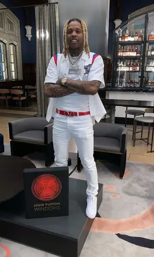 Lil Durk wearing Louis Vuitton shirt