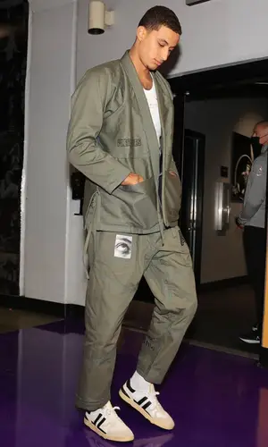 Kyle Kuzma wearing Pleasures pants
