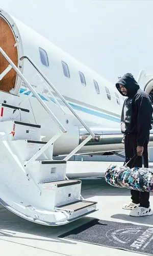 2 Chainz wearing Chrome Hearts bag